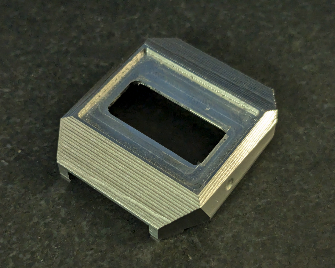 Machined damascus case showing layered steel construction